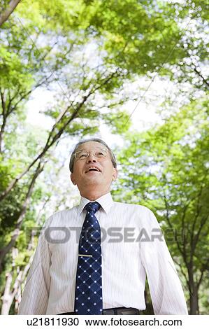 Businessman in Park View Large Photo Image Stock Image - Businessman in Park. Fotosearch