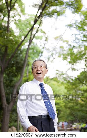 Businessman in Park View Large Photo Image Stock Photo - Businessman in Park. Fotosearch