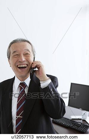 Businessman on Mobile Phone View Large Photo Image Stock Image - Businessman on Mobile Phone. Fotosearch