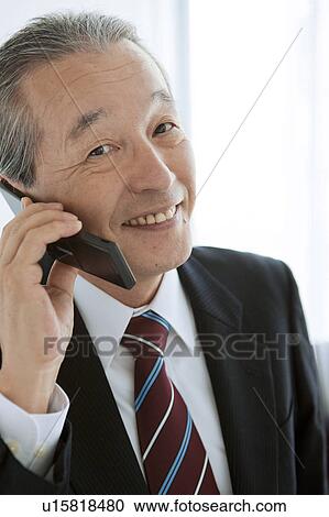 Businessman on Mobile Phone View Large Photo Image Stock Image - Businessman on Mobile Phone. Fotosearch