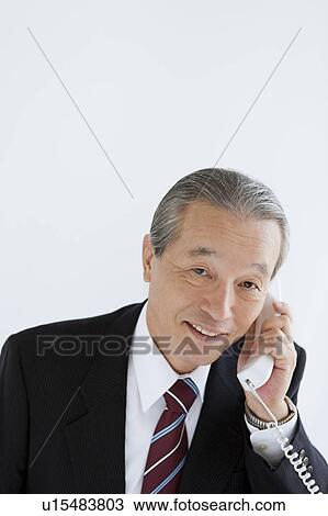 Businessman on Phone View Large Photo Image Stock Image - Businessman on Phone. Fotosearch