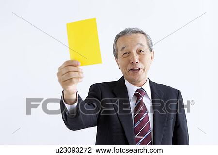Businessman Showing Yellow View Large Photo Image Stock Image - Businessman Showing Yellow. Fotosearch