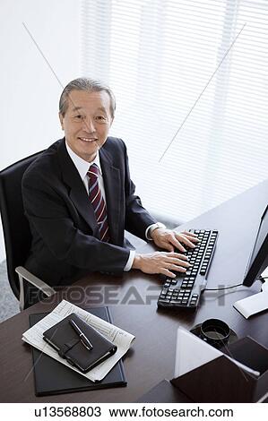Businessman Typing View Large Photo Image Stock Image - Businessman Typing. Fotosearch