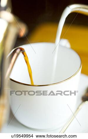 Picture - Cafe au lait being made. Fotosearch