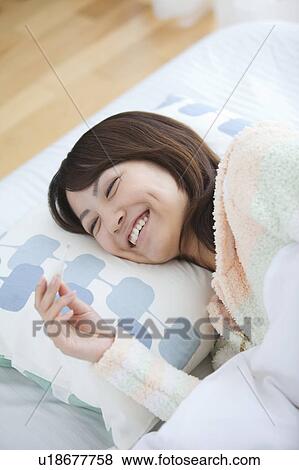 Cheerful Young Woman Recovering From Fever View Large Photo Image Stock Photo - Cheerful Young Woman Recovering From Fever. Fotosearch