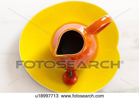 Stock Image - Cherry Tomato and Pitcher on Plate. Fotosearch