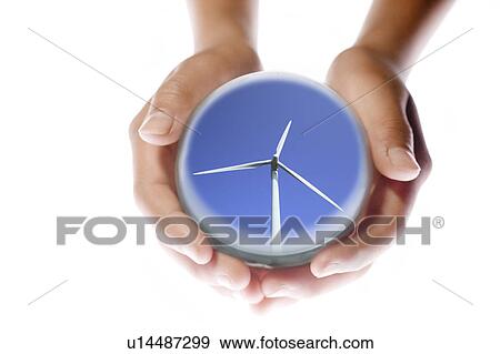 Stock Photo - Child Holding Globe Showing Windmill. Fotosearch