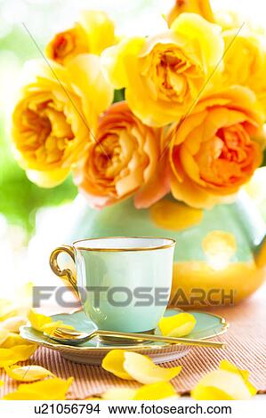 Coffee cup and rose petals View Large Photo Image Picture - Coffee cup and rose petals. Fotosearch