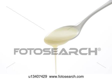 Condensed milk View Large Photo Image Stock Photo - Condensed milk. Fotosearch