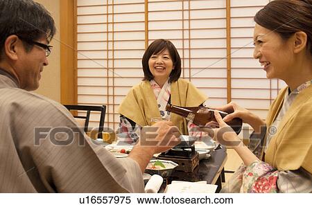 Daughter Pouring Beer For Her Father View Large Photo Image Stock Photography - Daughter Pouring Beer For Her Father. Fotosearch