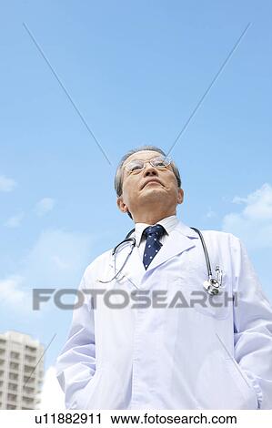 Doctor Against Sky View Large Photo Image Stock Image - Doctor Against Sky. Fotosearch