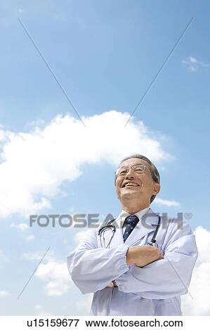 Doctor Against Sky View Large Photo Image Stock Photo - Doctor Against Sky. Fotosearch
