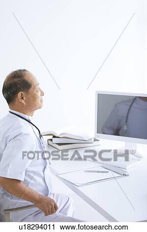 Doctor at His Desk View Large Photo Image Stock Image - Doctor at His Desk. Fotosearch