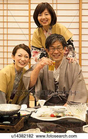 Family of Three at Dinner Table View Large Photo Image Stock Image - Family of Three at Dinner Table. Fotosearch