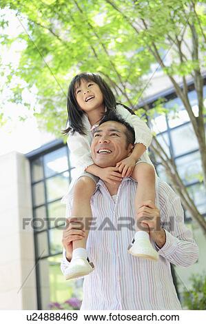 Father Carrying Girl On Shoulders View Large Photo Image Stock Photo - Father Carrying Girl On Shoulders. Fotosearch