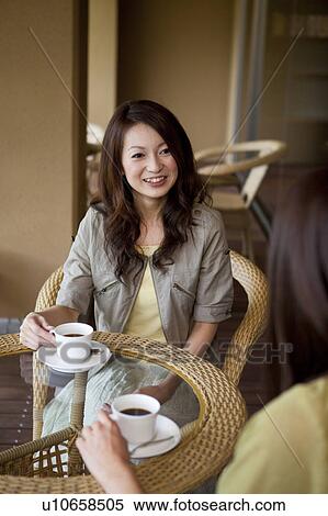 Female Friends in Cafe View Large Photo Image Stock Photography - Female Friends in Cafe. Fotosearch