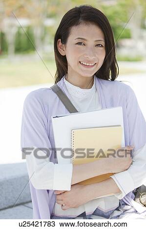 Stock Image - Female University Student. Fotosearch