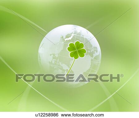 Stock Photograph - Four-leaf clover and earth. Fotosearch