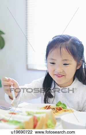 Girl Eating Spaghetti View Large Photo Image Stock Image - Girl Eating Spaghetti. Fotosearch