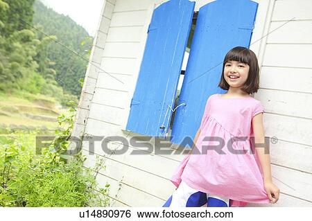 Girl Leaning on Wall View Large Photo Image Stock Photograph - Girl Leaning on Wall. Fotosearch