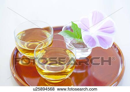 Green tea and morning glory View Large Photo Image Stock Photo - Green tea and morning glory. Fotosearch