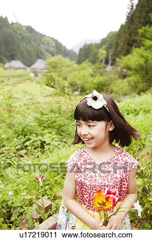 Happy Girl Collecting Flowers View Large Photo Image Stock Image - Happy Girl Collecting Flowers. Fotosearch