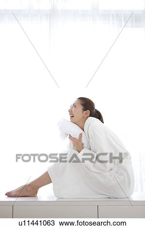 Happy Young Woman in Dressing Gown View Large Photo Image Stock Image - Happy Young Woman in Dressing Gown. Fotosearch