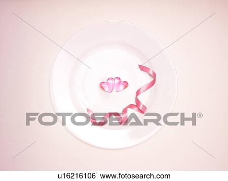 Stock Photograph - Heart Shaped Sweets on Plate. Fotosearch