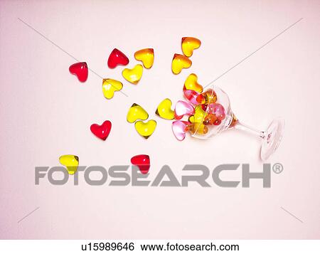 Heart Shaped Sweets Spilling From Wineglass View Large Photo Image Stock Photograph - Heart Shaped Sweets Spilling From Wineglass. Fotosearch