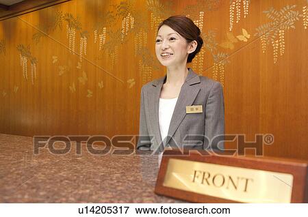 Hotel Receptionist, Focus On Woman View Large Photo Image Stock Photo - Hotel Receptionist, Focus On Woman. Fotosearch