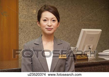 Hotel Receptionist View Large Photo Image Picture - Hotel Receptionist. Fotosearch