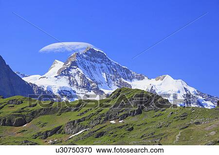 Stock Image - Jungfrau seen from First, Grindelwald, Switzerland. Fotosearch