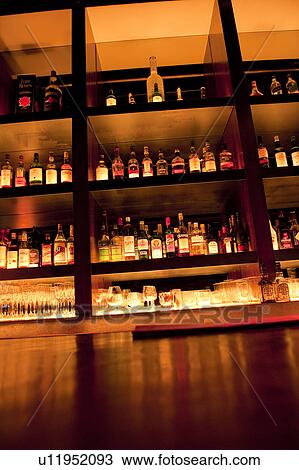 Stock Image - Liquor Bottles at Bar. Fotosearch