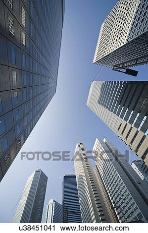 Low angle view of skyscrapers, Shinjuku ward, Tokyo Prefecture, Honshu, Japan View Large Photo Image Stock Image - Low angle view of skyscrapers, Shinjuku ward, Tokyo Prefecture, Honshu, Japan. Fotosearch