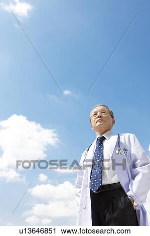 Male Doctor Against Sky View Large Photo Image Stock Image - Male Doctor Against Sky. Fotosearch