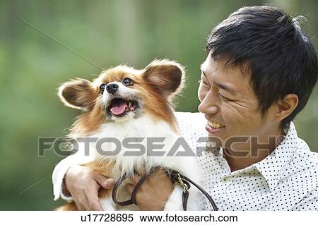 Man and Papillon View Large Photo Image Stock Photography - Man and Papillon. Fotosearch