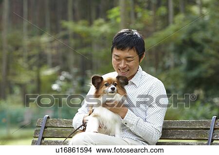 Man with Papillon Dog View Large Photo Image Picture - Man with Papillon Dog. Fotosearch