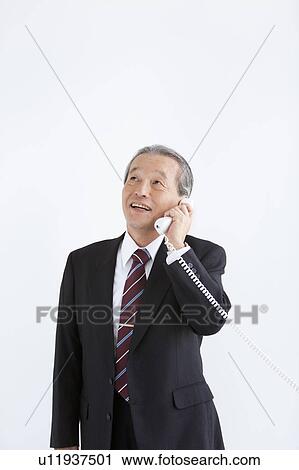 Mature Businessman on Phone View Large Photo Image Stock Image - Mature Businessman on Phone. Fotosearch