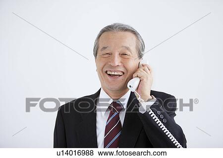 Mature Businessman on Phone View Large Photo Image Stock Photo - Mature Businessman on Phone. Fotosearch