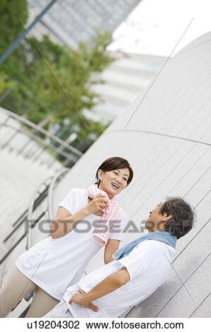 Stock Image - Mature Couple Cooling Down. Fotosearch