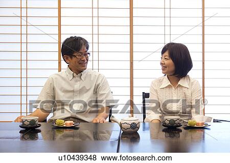 Mature Couple Having Tea and Sweets View Large Photo Image Stock Photo - Mature Couple Having Tea and Sweets. Fotosearch