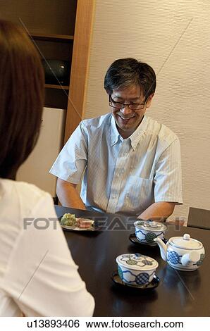 Stock Photograph - Mature Couple Having Tea. Fotosearch