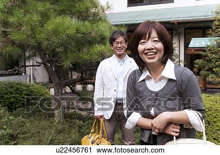 Stock Image - Mature Couple in Garden. Fotosearch