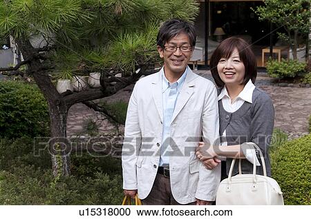 Mature Couple in Japanese Garden View Large Photo Image Stock Image - Mature Couple in Japanese Garden. Fotosearch