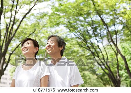 Stock Photograph - Mature Couple in Park. Fotosearch
