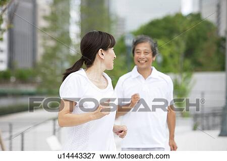 Stock Photo - Mature Couple Jogging. Fotosearch