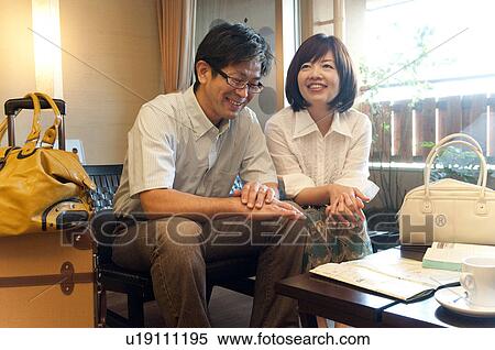Stock Photography - Mature Couple Planning Trip. Fotosearch