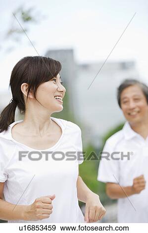 Stock Photo - Mature Couple Running. Fotosearch