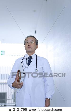 Mature Doctor Walking View Large Photo Image Stock Photography - Mature Doctor Walking. Fotosearch