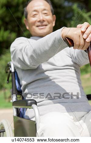 Mature Man in Wheelchair View Large Photo Image Stock Image - Mature Man in Wheelchair. Fotosearch